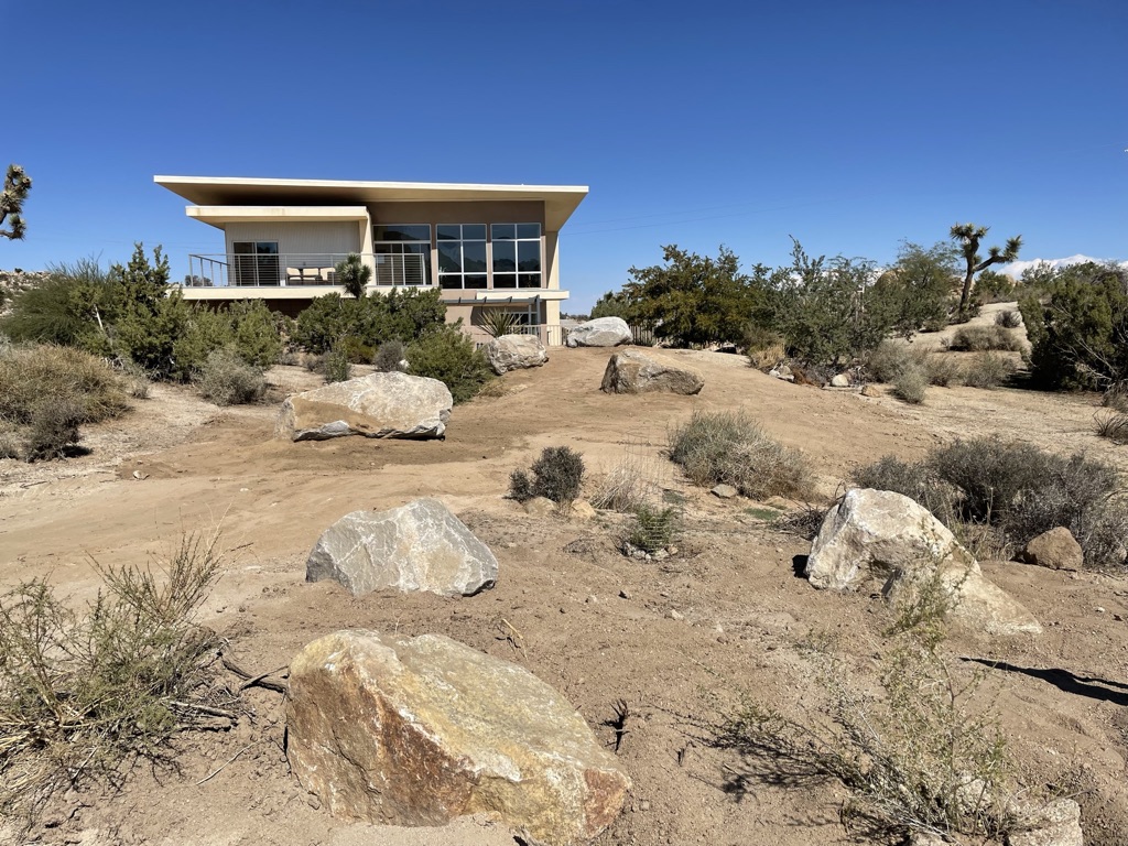 Our house and the new rock landscape